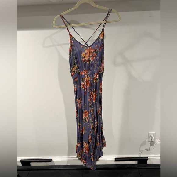 American Eagle Purple Floral Cropped Ruffle Wide
Leg Flowy Jumpsuit - Picture 2 of 7